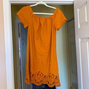 Light weight burnt orange flow dress. Perfect paired with boots.